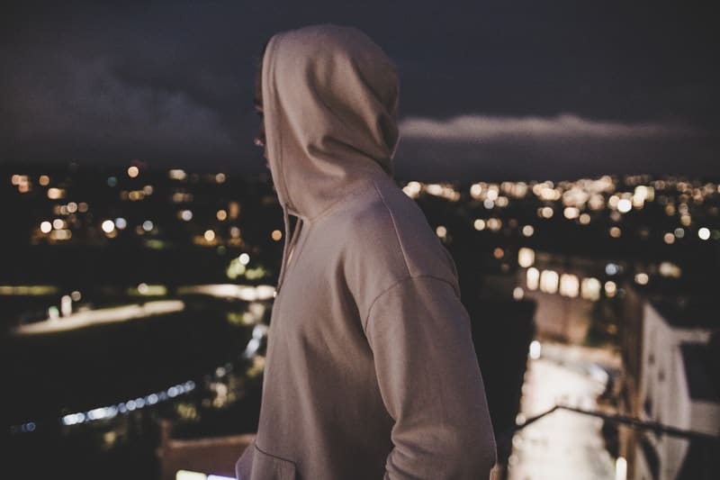 man in grey hoodie