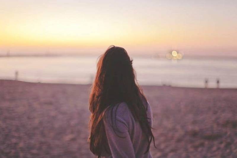 Frau am Strand