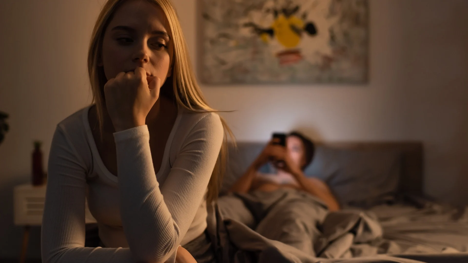 Mann und Frau im Bett