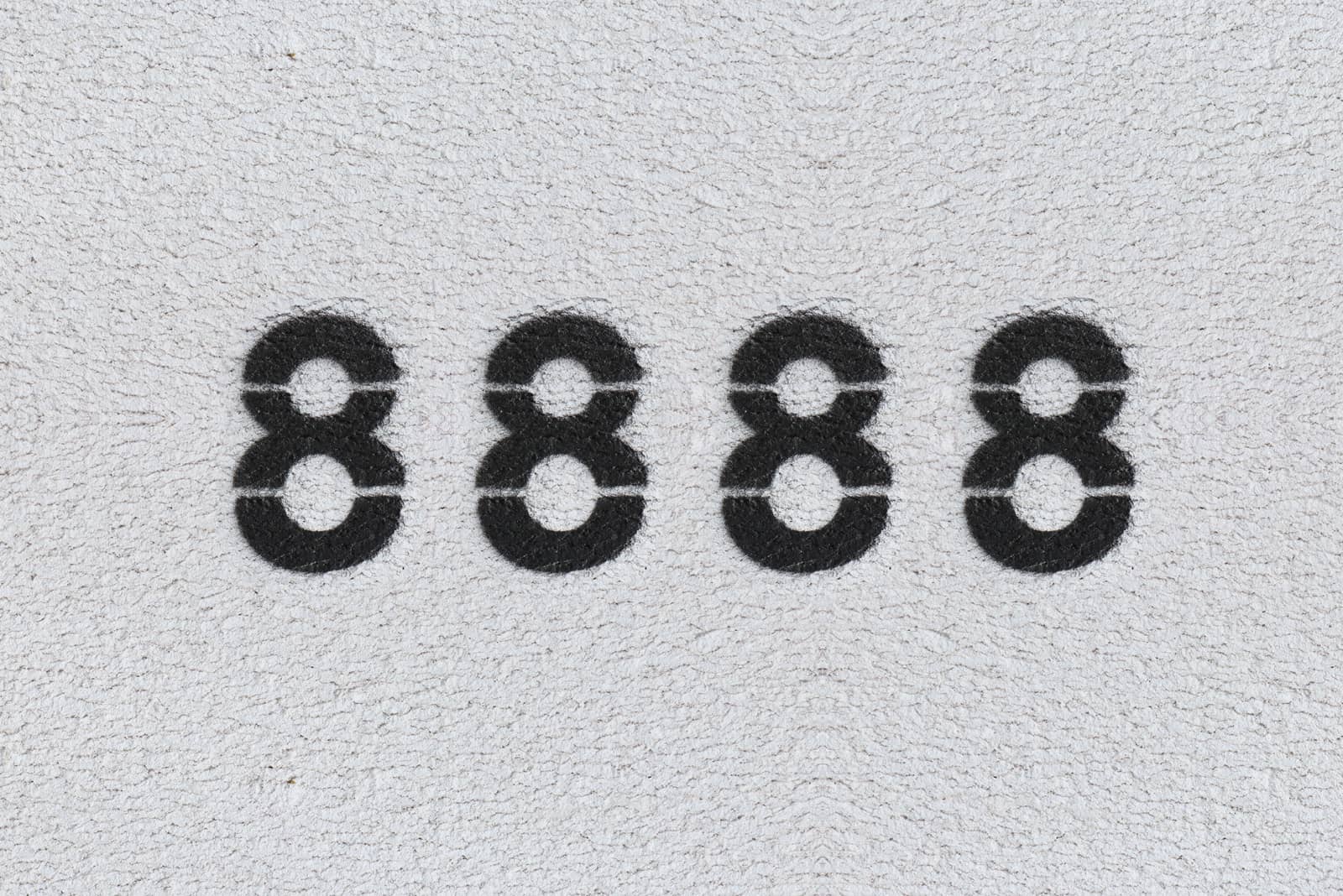 schwarze Zahlen 8888 auf grauem Hintergrund