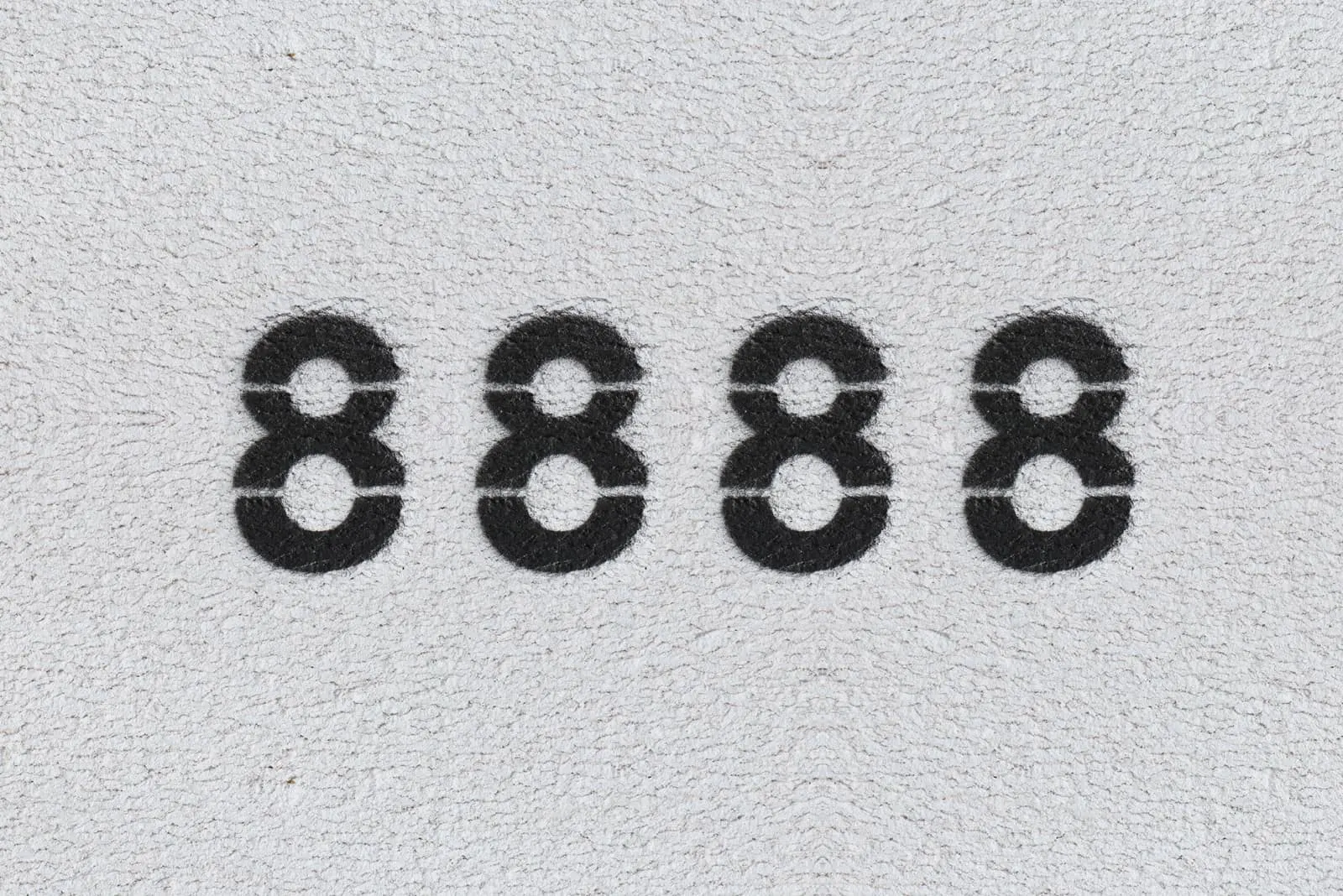 schwarze Zahlen 8888 auf grauem Hintergrund
