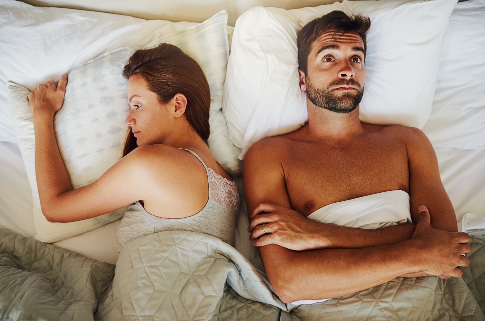 frustriertes Paar im Bett