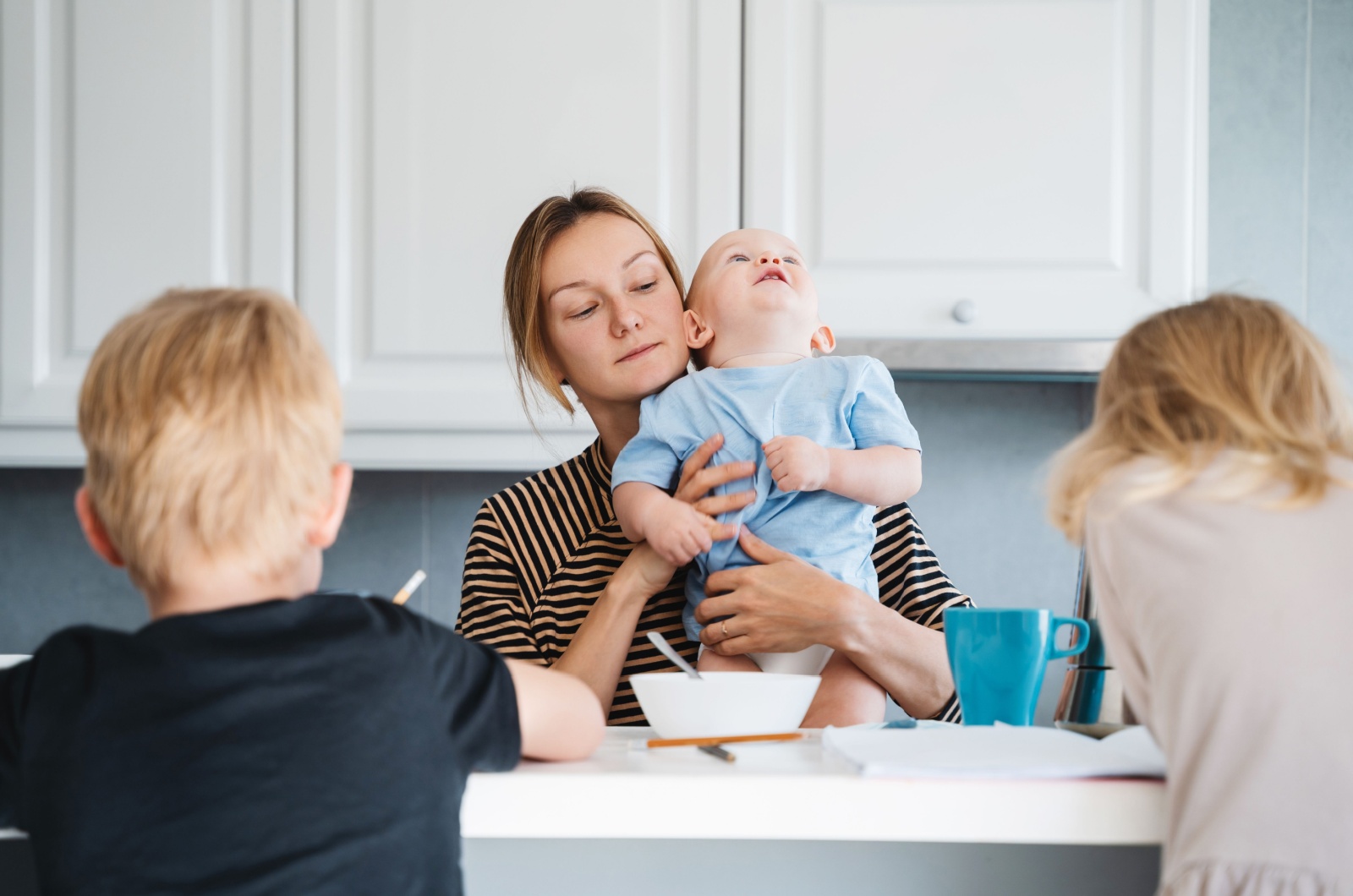 mutter mit drei kindern